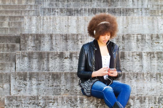 Young woman listening to music