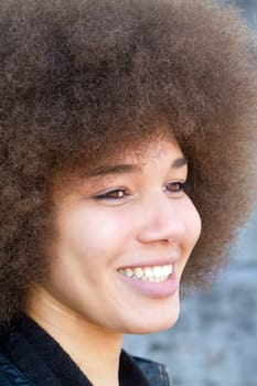 Portrait of a young woman with afrolook