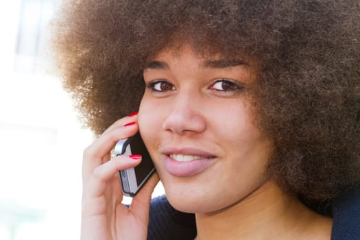 Teenagers making phone calls with their smartphones