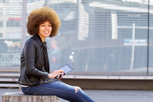 Young woman with tablet