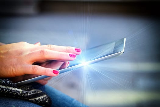 Young modern woman with tablet