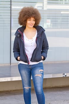 Portrait of a teenager with an afro hairstyle