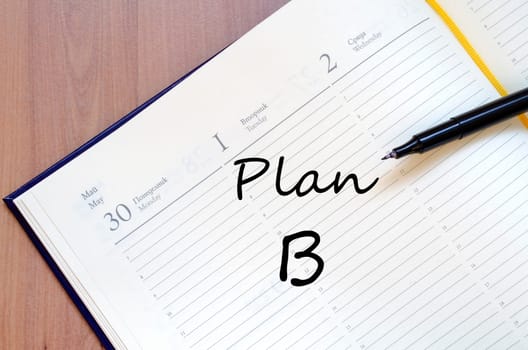 Plan b text concept write on notebook with pen