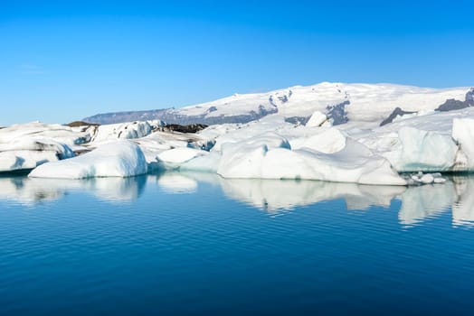 Beautiful view of icebergs in Jokulsarlon glacier lagoon, Iceland   selective focus