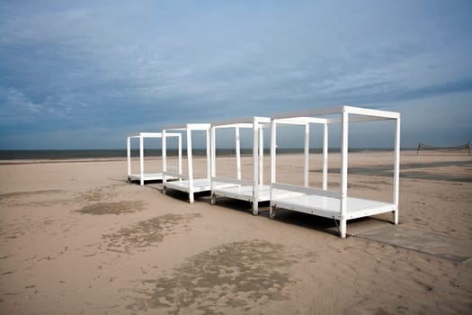 White wooden frames on the beach