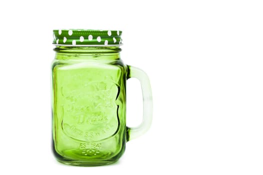 Green mason glass on white background, stock photo