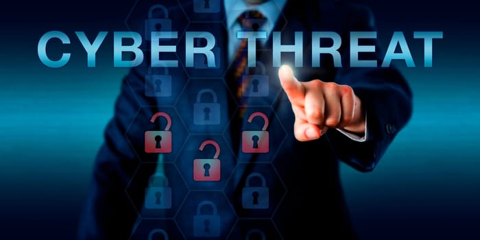 Governmental intelligence provider is pressing CYBER THREAT on a touch screen. Business metaphor and security industry concept. Three virtual padlock icons light up red signifying a security breach.