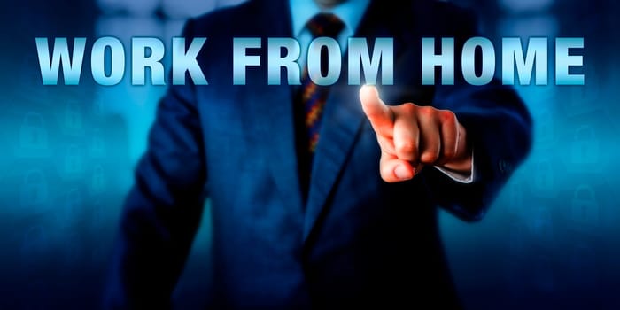 Entrepreneur is pushing WORK FROM HOME on a touch screen. Business metaphor and technology concept for freelancing, short-term or temporary contractor work, minijobber, outsourcing and offshoring.