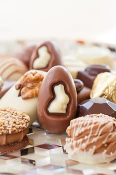 Selection of different chocolates with tender and milk chocolate