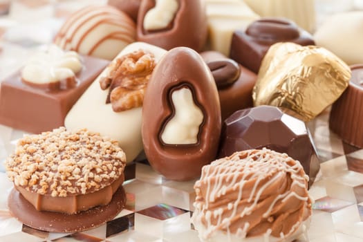 Selection of different chocolates with tender and milk chocolate