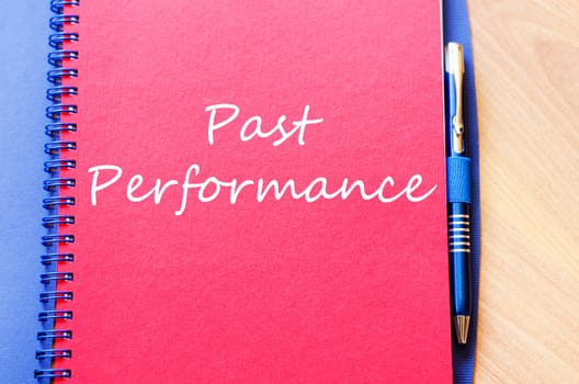 Past performance text concept write on notebook with pen