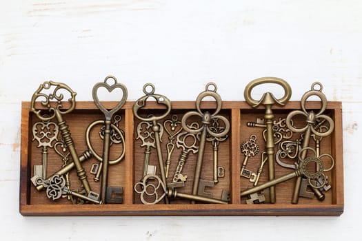 vintage key in old wooden box