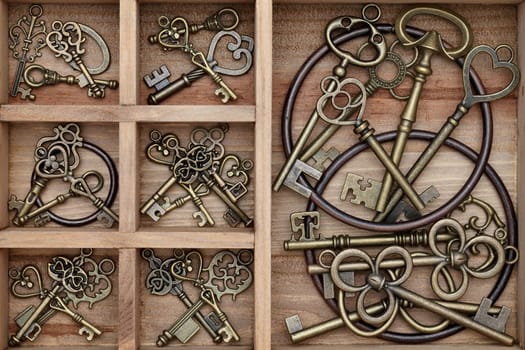 close up of vintage key in old wooden box