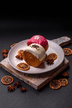 Round sweet New York roll croissant with several flavors cream filling on a dark concrete background