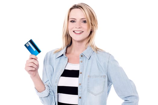 Trendy young girl displaying her credit card