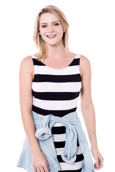Young woman posing to camera in trendy outfit