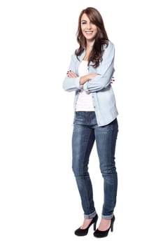 Picture of young smiling female standing with folded hands