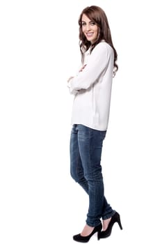 Side pose of beautiful woman in trendy costume
