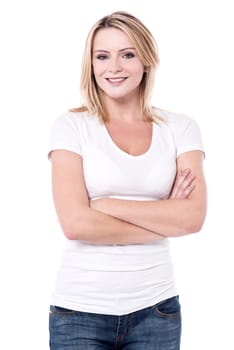 Attractive young woman posing with folded arms