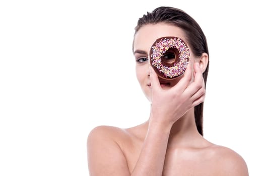 Topless woman focusing through the donut