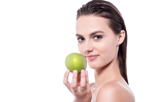 Young smiling woman giving an apple to you