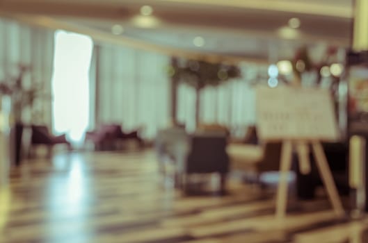 Blurred image of indoor living room or hotel lobby