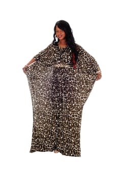 A beautiful African American woman standing in an African dress, holding.her dress, isolated for white background..