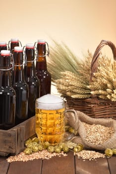 Beer box and beer glass with wheat,barley,hops and malt