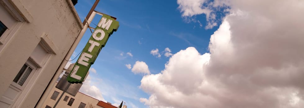 It's a clear blue sky day on main street in this one motel town