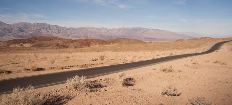 Badwater Road meanders through Death Valley below sea level only sees 2" of rain a year"