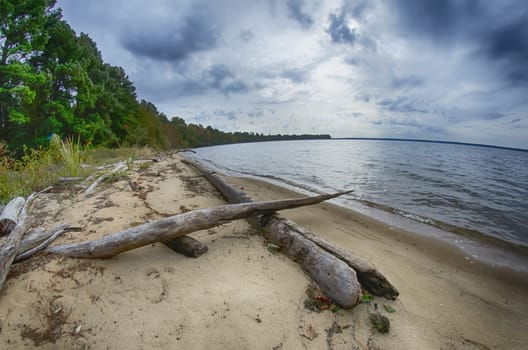 cloudy skies over body of water