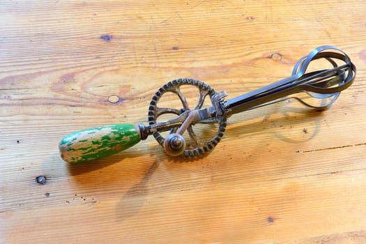 Old mixer on an old wooden table