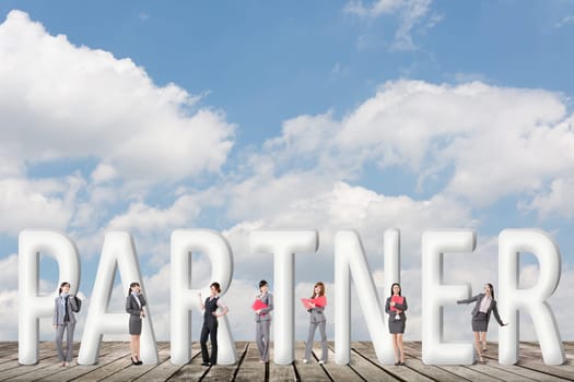 Concept of partner, friends,collaborate with group of business people stand with 3d text.