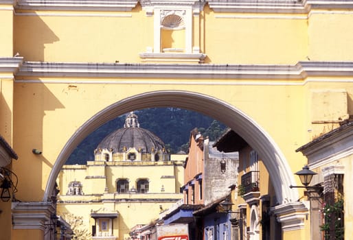 tha arco de santa catalina in the old town in the city of Antigua in Guatemala in central America.