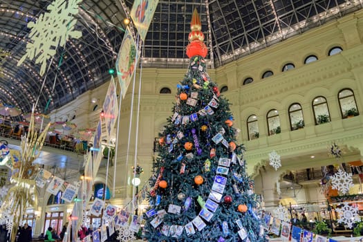Moscow, Russia - January 05, 2016: A large decorated Christmas tree in GUM