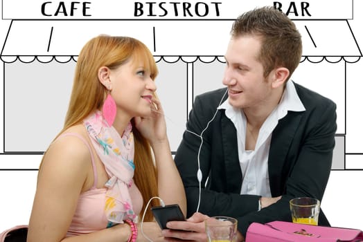 a young couple listening to music together on the cafe terrace