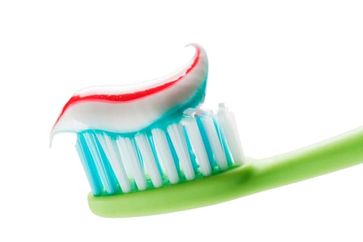 Toothbrush and toothpaste isolated on white close up.