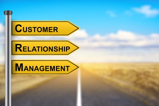 CRM or Customer relationship management words on yellow road sign with blurred background