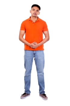 young casual man wearing orange tshirt on white isolated background