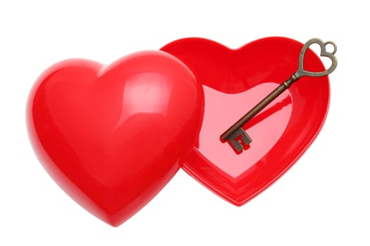Antique rusty key and a red heart for Valentine's day