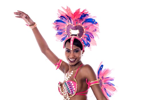 Cheerful samba woman dancing in pretty costume