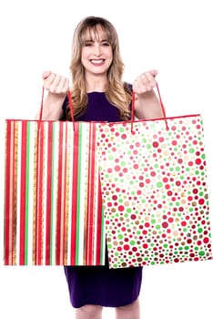 Picture of happy smiling woman holding shopping bag