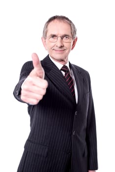 Handsome senior manager gesturing thumbs up over white