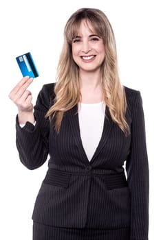 Corporate lady showing her cash card to camera.