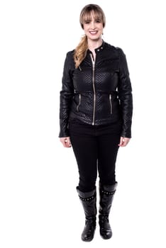 Woman in trendy wear, full length portrait.