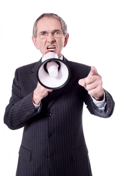 Senior male screaming loudly in a megaphone