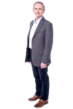 Full length image of a senior man against white background