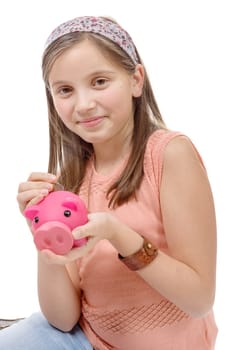 a preteen with a piggy bank, on white