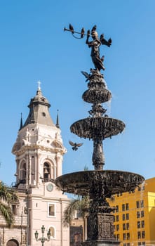 Bronze fountain and Cathedral, Plaza de Armas, Lima
