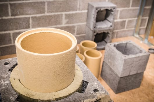 Construction of modular ceramic chimney in the house
